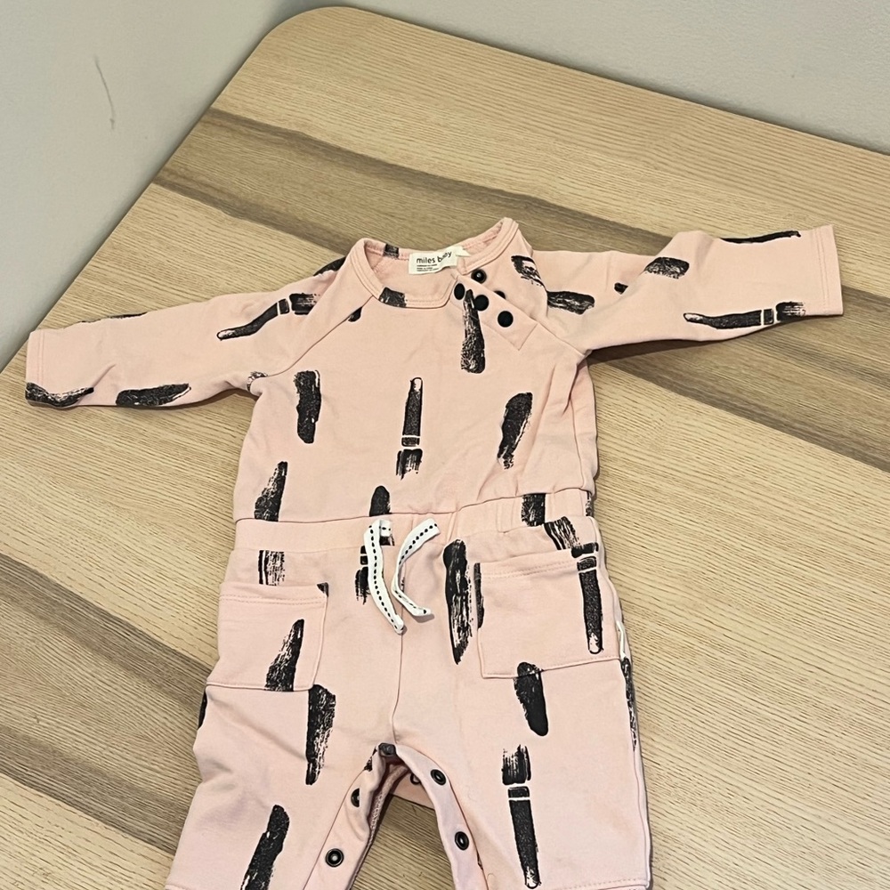 Miles the Label Pink Baby Romper/Onesie with Black Brushstroke Design